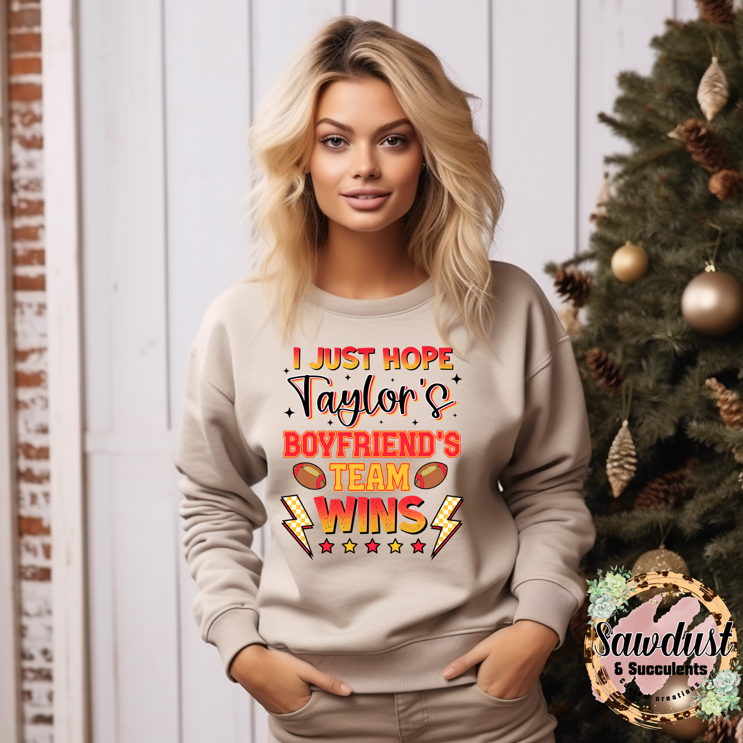 I just hope Taylor‘s boyfriend’s team wins graphic crew sweater