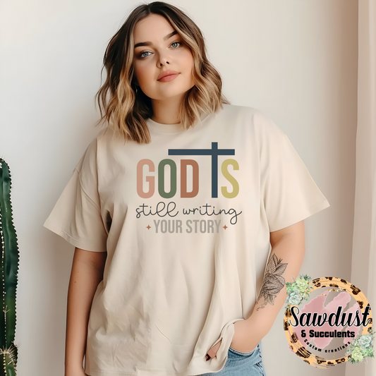 God Is Still Writing Your Story Graphic Tee
